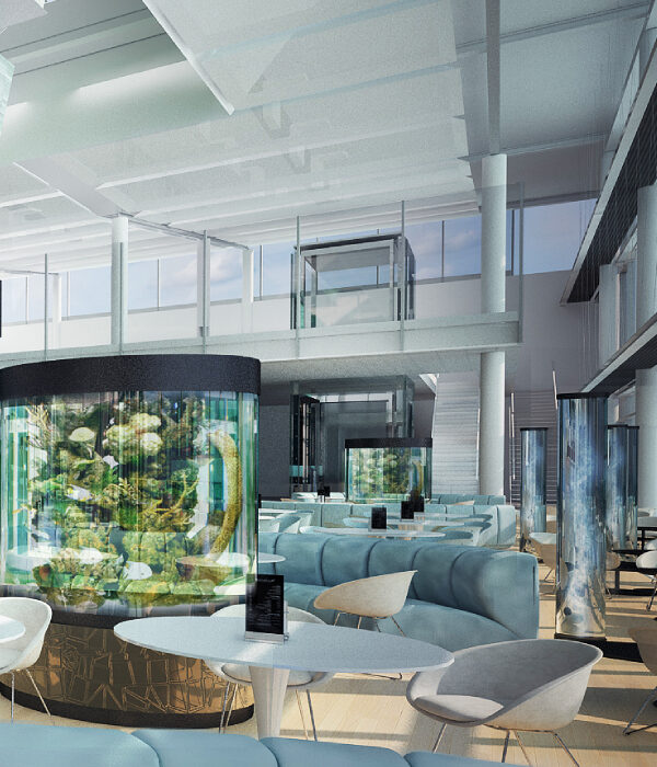 Zone de détente zen avec vue sur aquarium dans le café-restaurant de l’aéroport de Munich, banquettes EPSILON courbes et assises modulaires